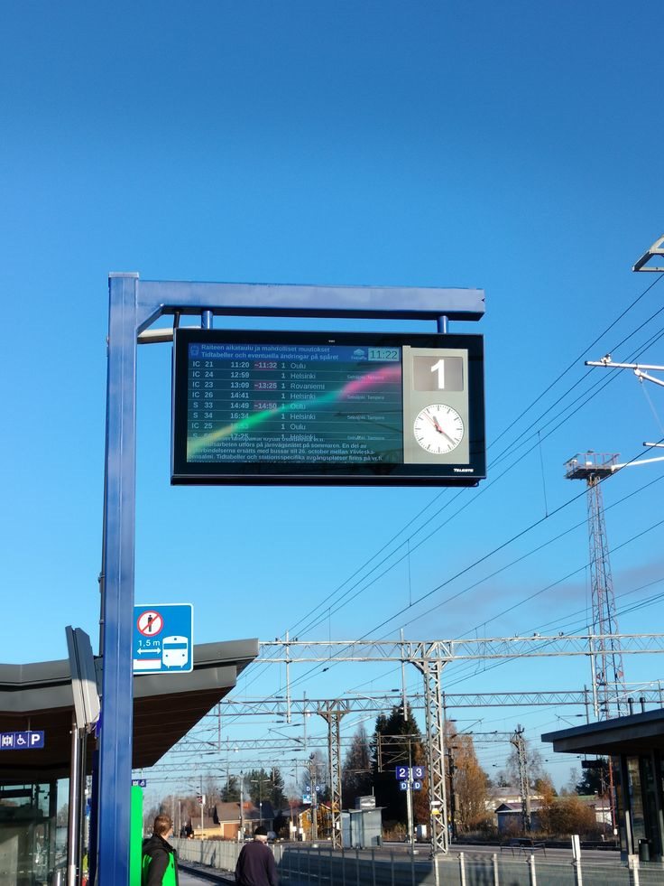 Outdoor transit information display at a railway platform